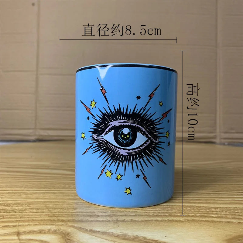 Copo de café cerâmico do olho abstrato com tampa, talheres, aromaterapia, vela, garrafa dos doces, criativo, decoração home